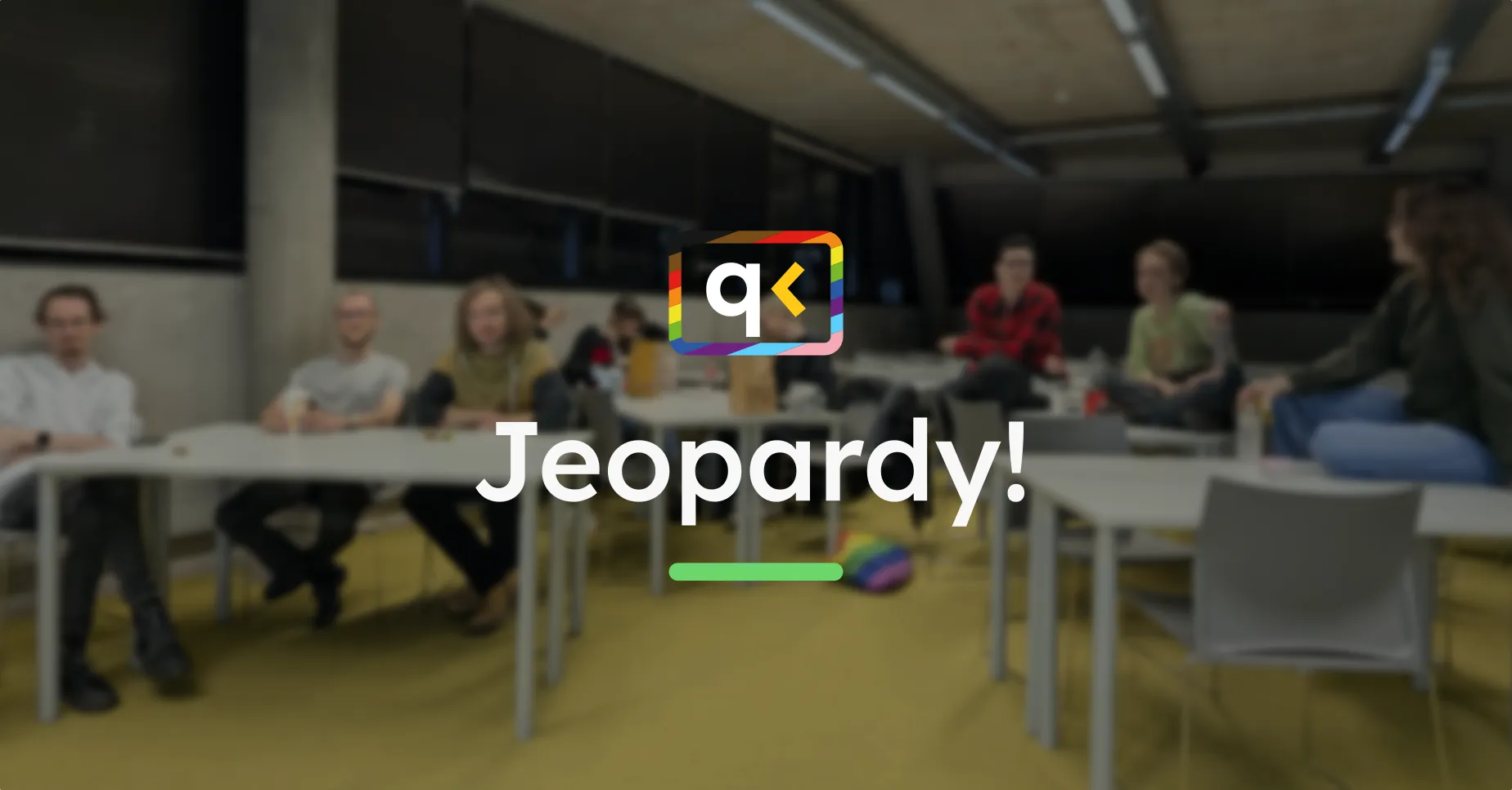 In the background of the image is a picture of a group of people sitting together in groups playing Jeopardy. In the foreground there is the the QuacK Logo and the Text"Jeopardy!".