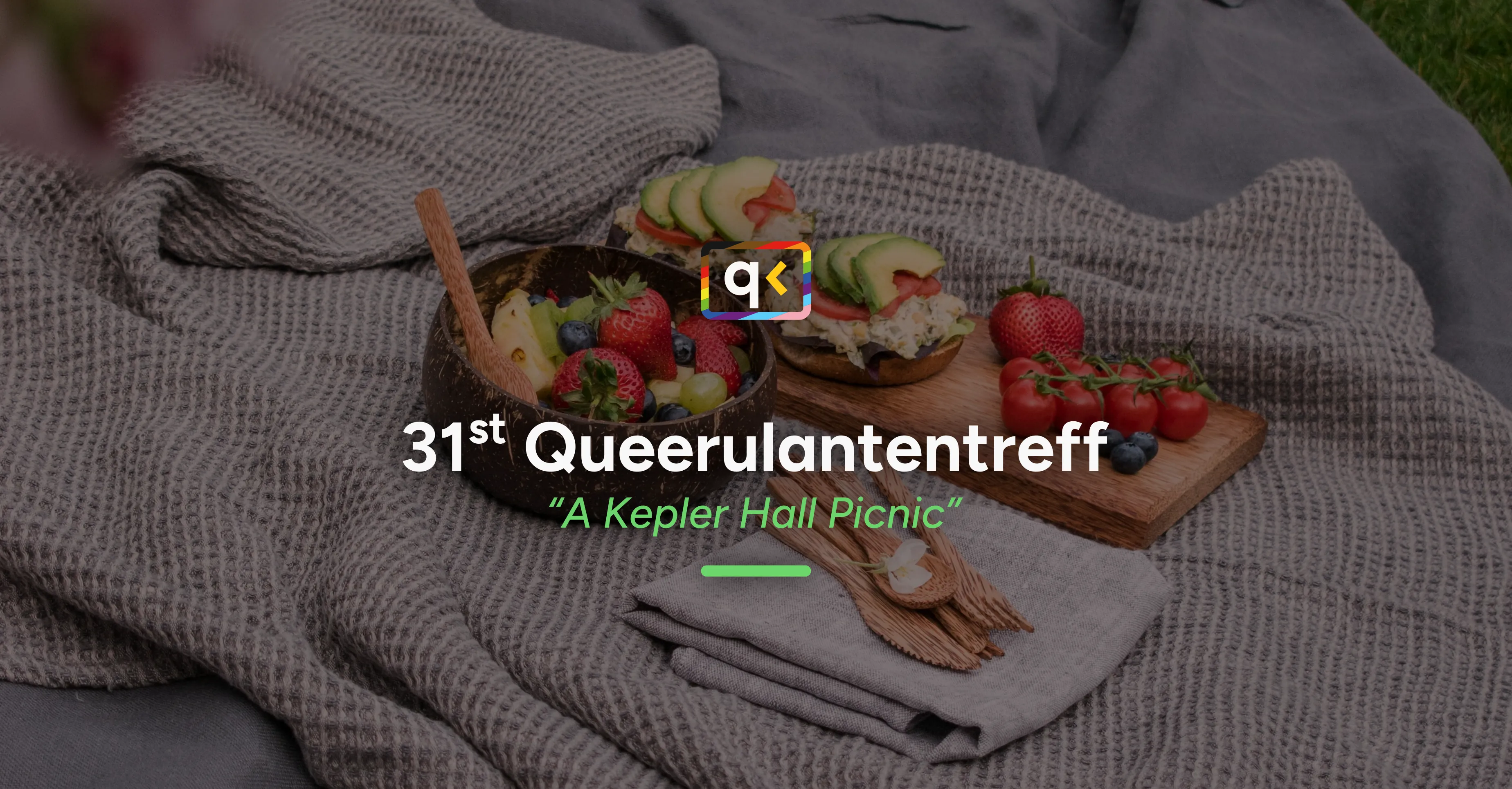 The image shows some picnic blankets with two avocado bagels as well as a fruit bowl. Centered above the background is the tetxt "31st Queerulantentreff—A Kepler Hall Picnic".